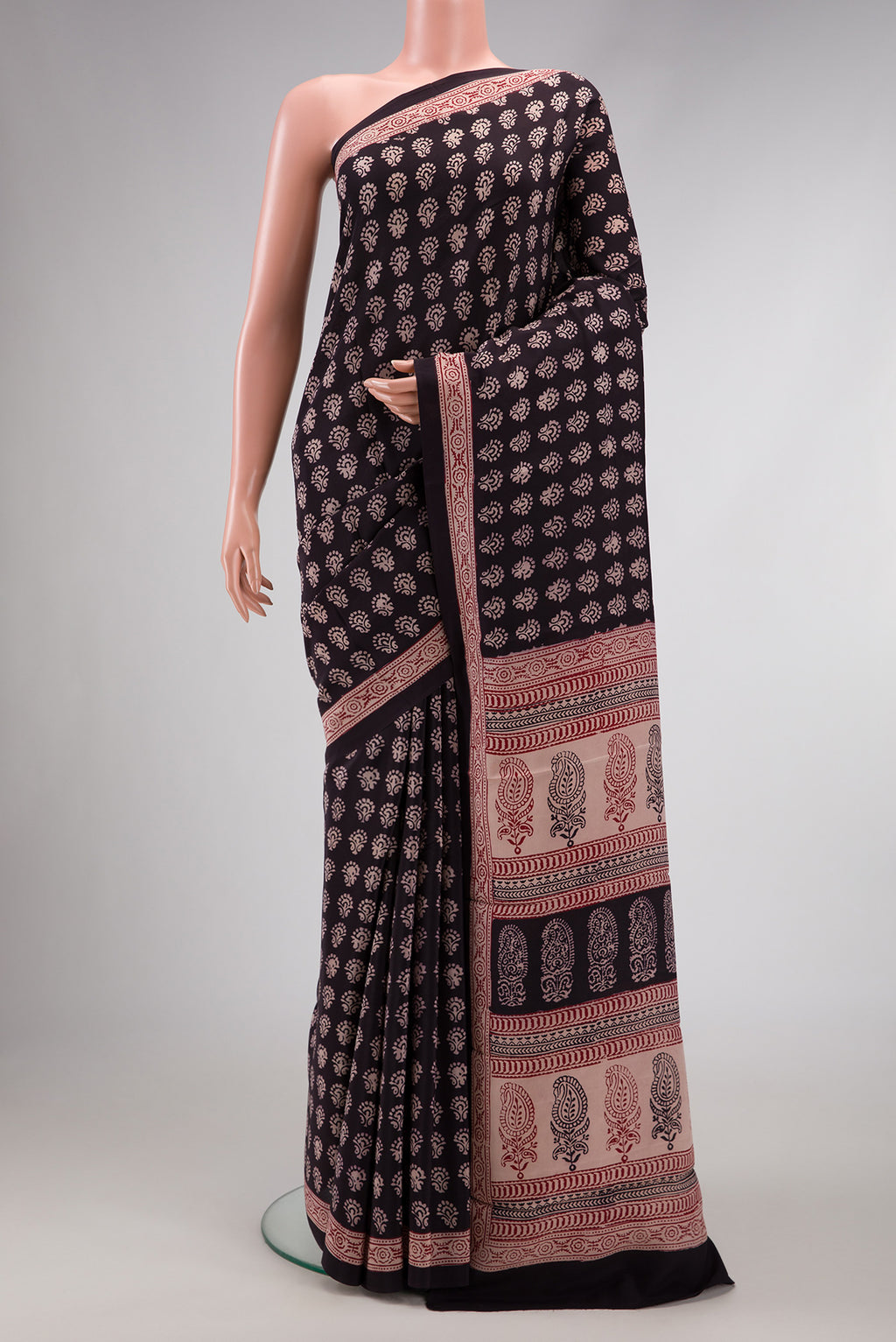 Coffee Brown Dual Tone Mysore Crepe Saree with Printed design on the body and Printed Border.  displayed on a mannequin