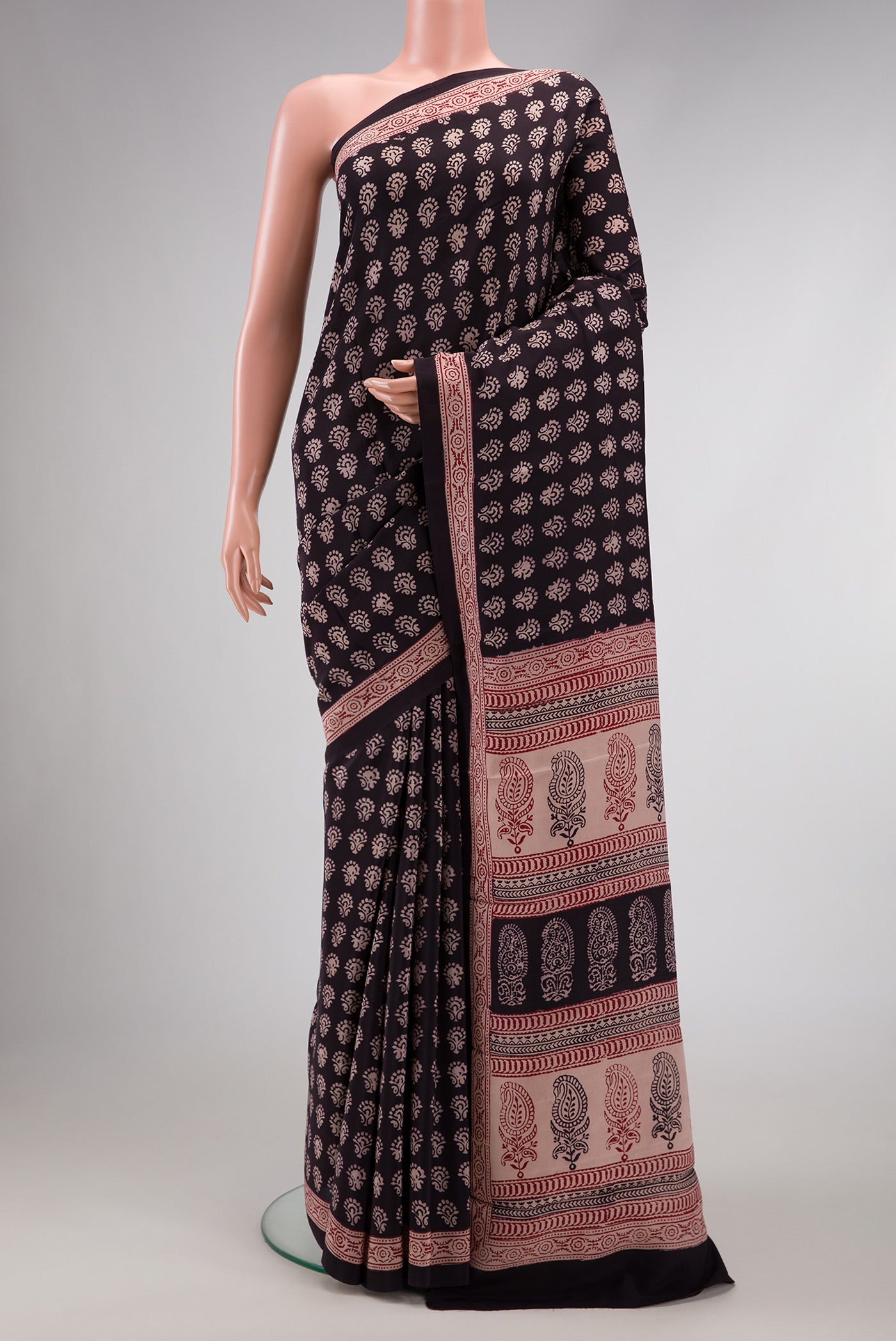 Coffee Brown Dual Tone Mysore Crepe Saree with Printed design on the body and Printed Border.  displayed on a mannequin