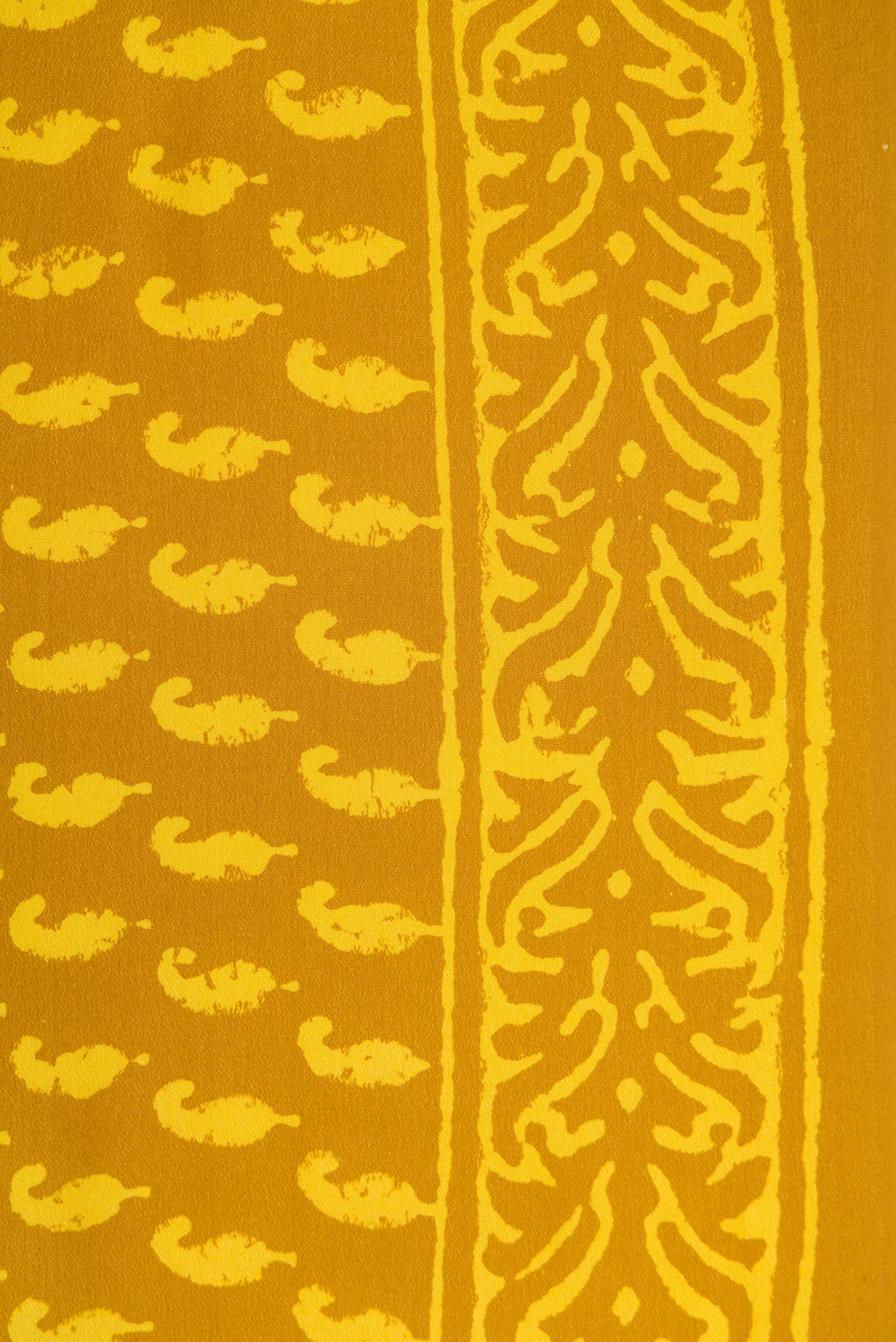 Border image of Mustard Dual Tone Mysore Crepe Saree with Printed design on the body and Printed Border. 