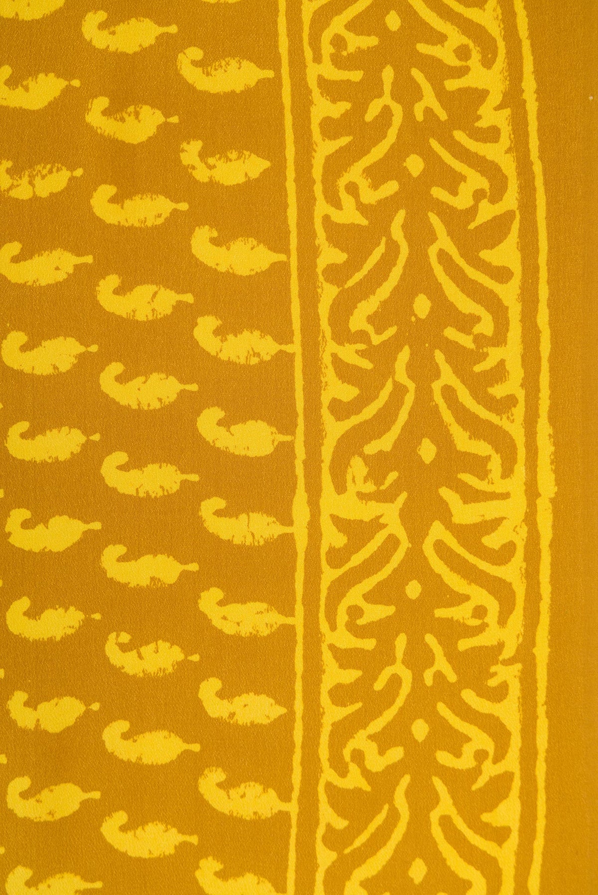 Border image of Mustard Dual Tone Mysore Crepe Saree with Printed design on the body and Printed Border. 
