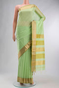 Green Maheshwari Silk Cotton Saree with Plain Body and Zari Border displayed on a mannequin