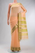 Peach Maheshwari Silk Cotton Saree with Plain Body and Zari Border displayed on a mannequin