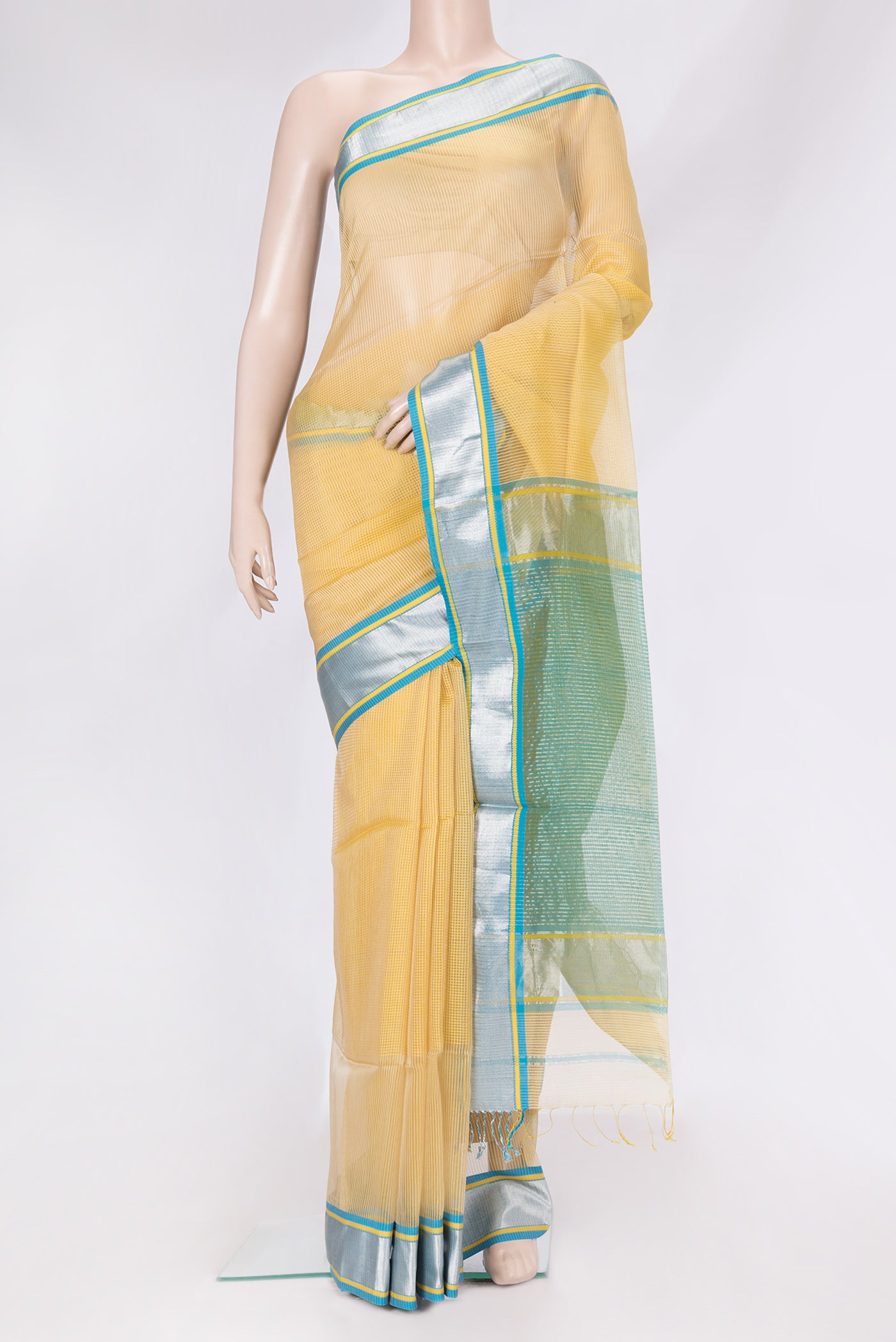 Beige Dual Tone Maheshwari Silk Saree with Stripes on the body and Zari Border.  displayed on a mannequin
