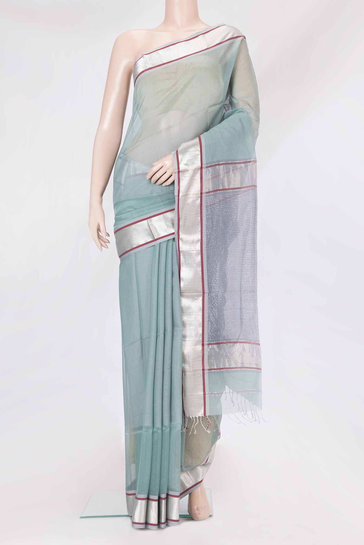 Sea Green Dual Tone Maheshwari Silk Saree with Stripes on the body and Zari Border.  displayed on a mannequin