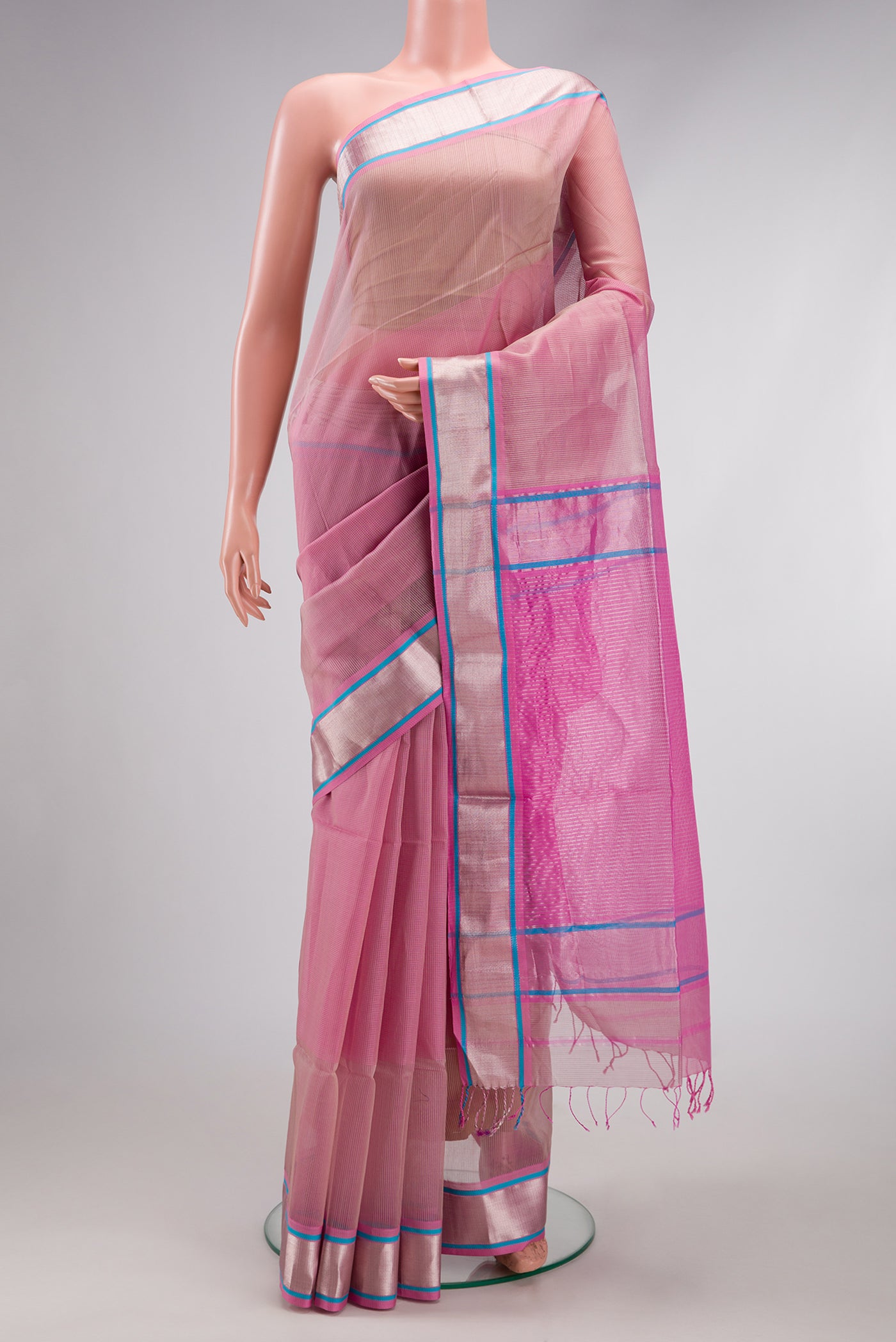 Pink Dual Tone Maheshwari Silk Cotton Saree with Stripes on the body and Zari Border.  displayed on a mannequin