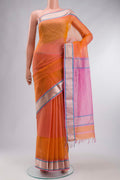Orange Maheshwari Silk Cotton Saree with Stripes on the body and Zari Border displayed on a mannequin