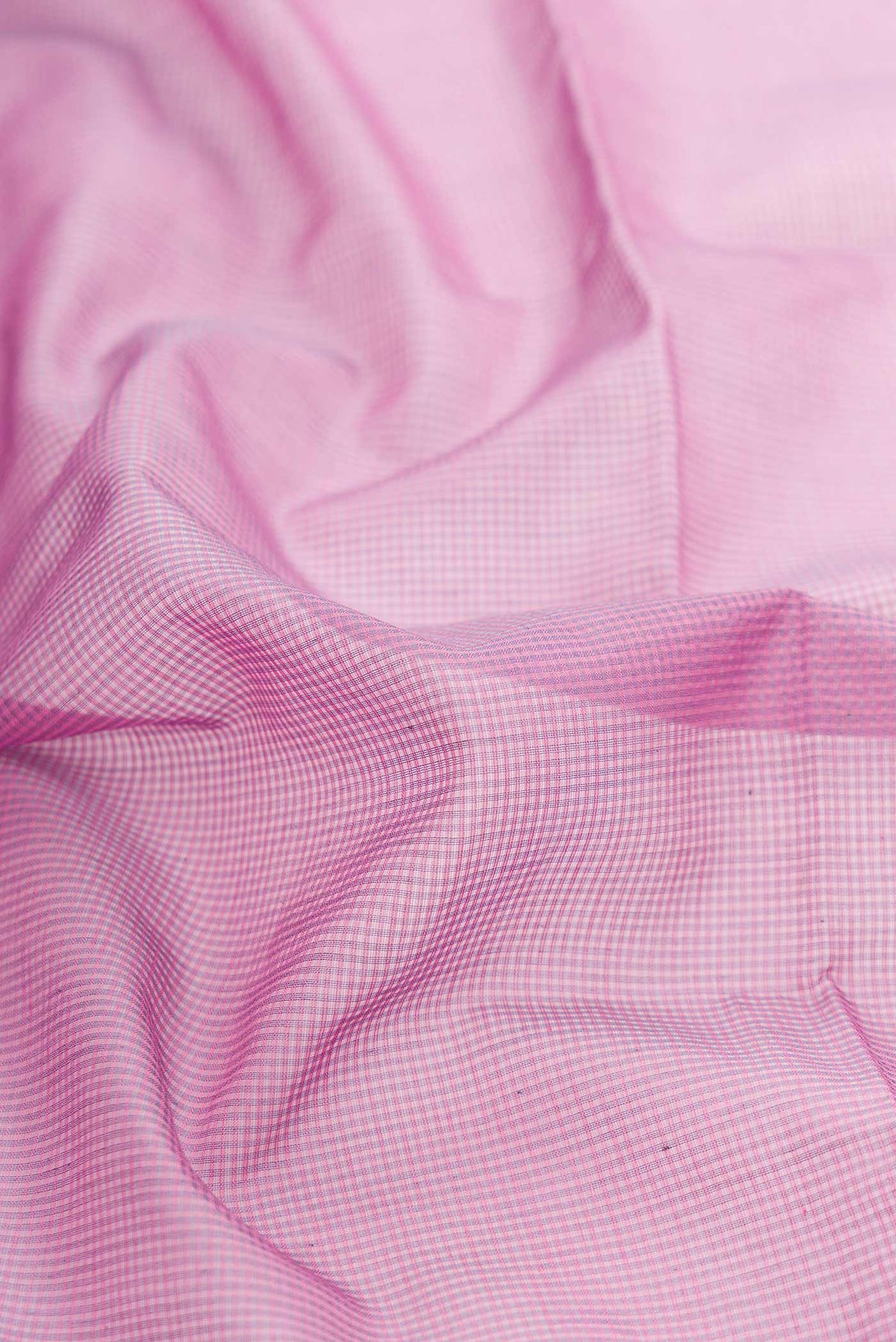 Close up of Lavender Dual Tone Silk Cotton Saree with Checked design on the body and Zari Border displaying folds