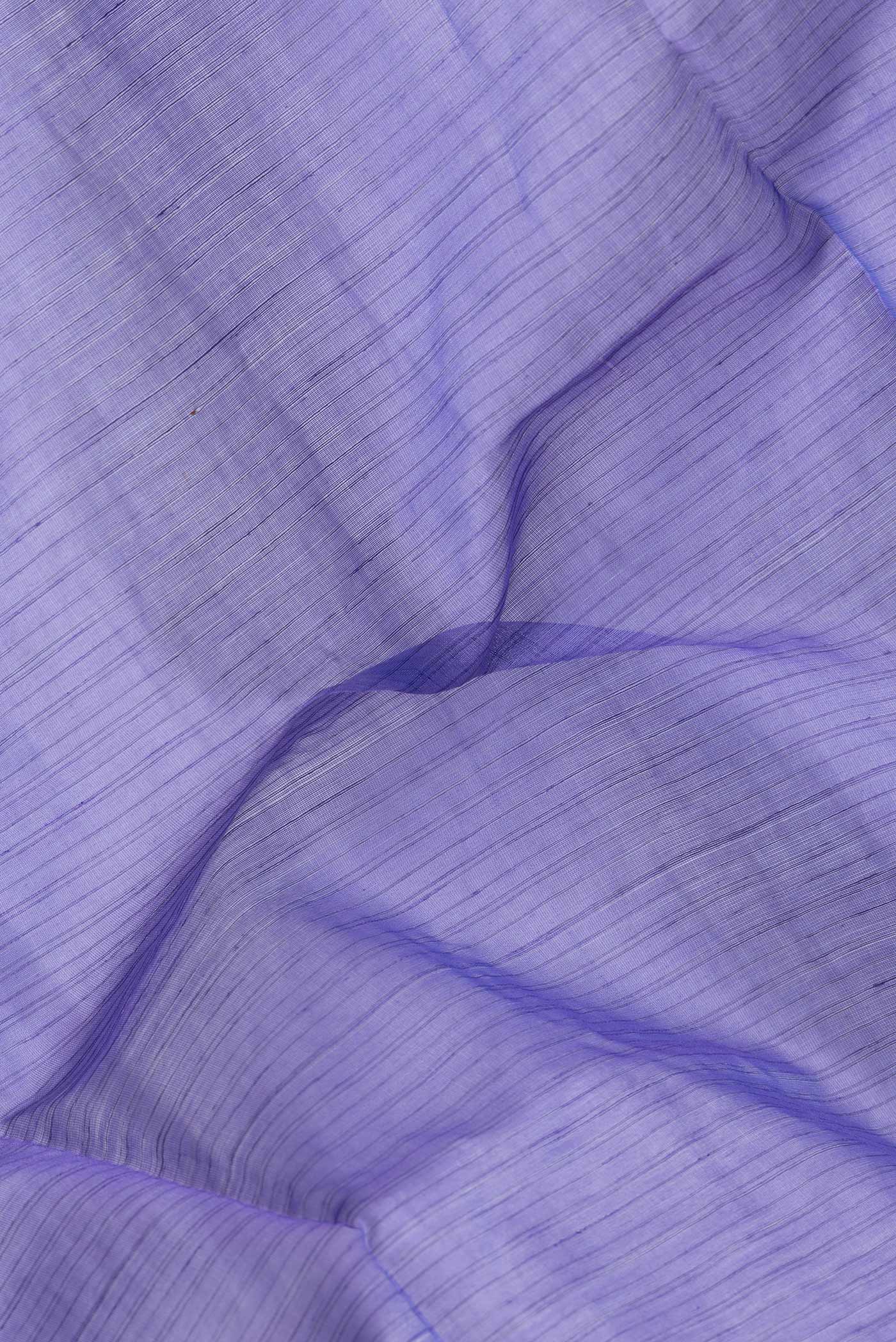 Close up of Lavender Dual Tone Maheshwari Silk Saree with Stripes on the body and Zari Border.  displaying folds