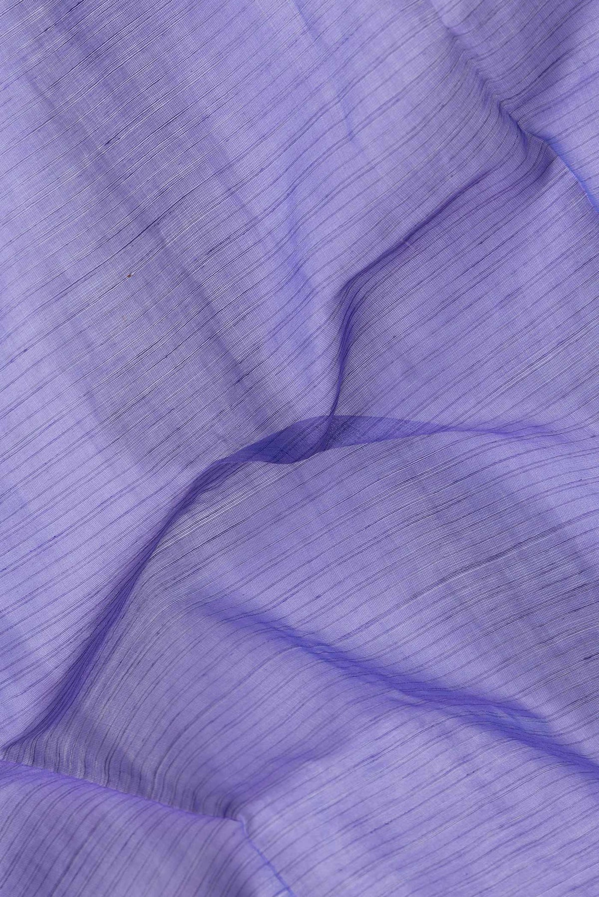 Close up of Lavender Dual Tone Maheshwari Silk Saree with Stripes on the body and Zari Border.  displaying folds