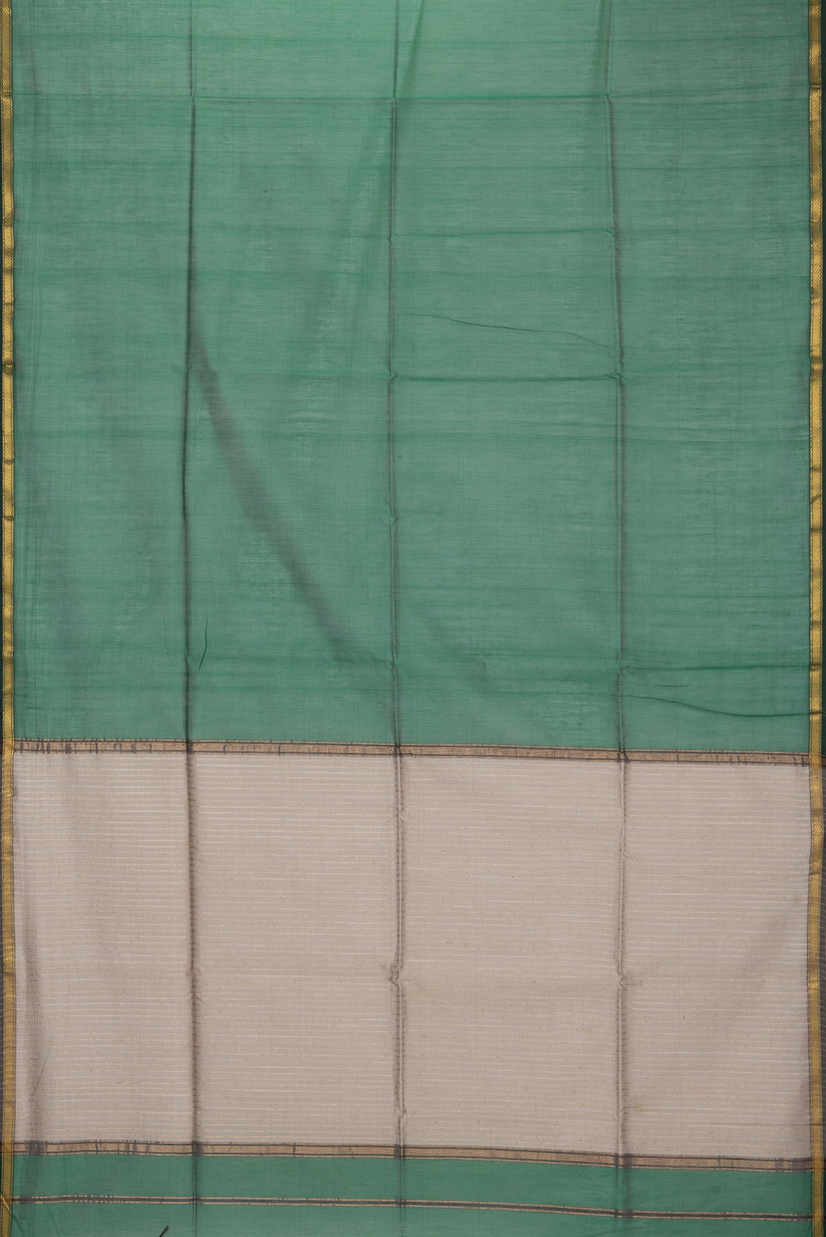 Flat view of Grey Maheshwari Silk Saree with Stripes on the body and Zari Border. 