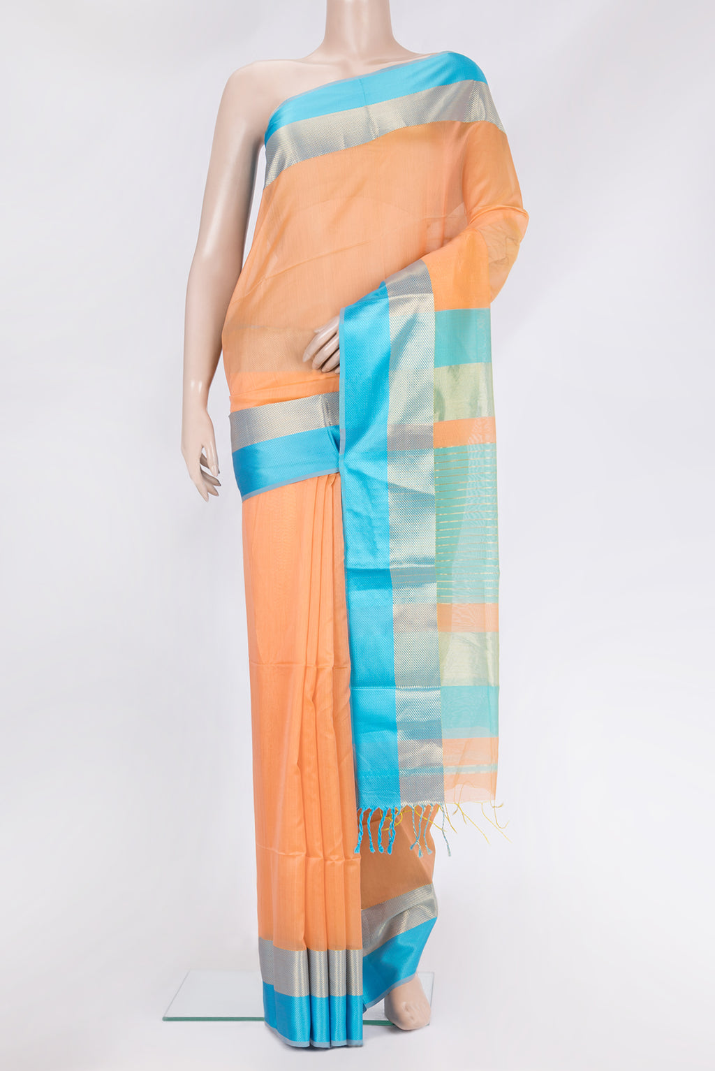 Golden Peach Maheshwari Silk Saree with Plain Body and Zari And Thread Border.  displayed on a mannequin