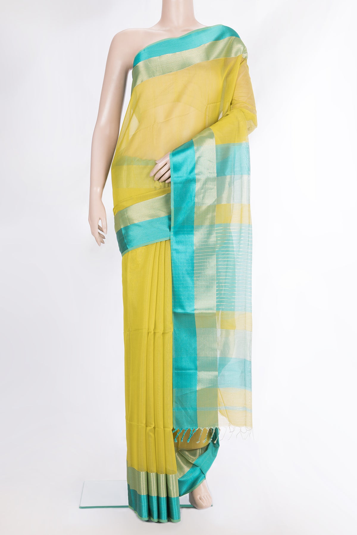 Pure Silk Parrot Green Dual Tone Maheshwari Saree with Plain Body and Zari And Thread Border.  displayed on a mannequin