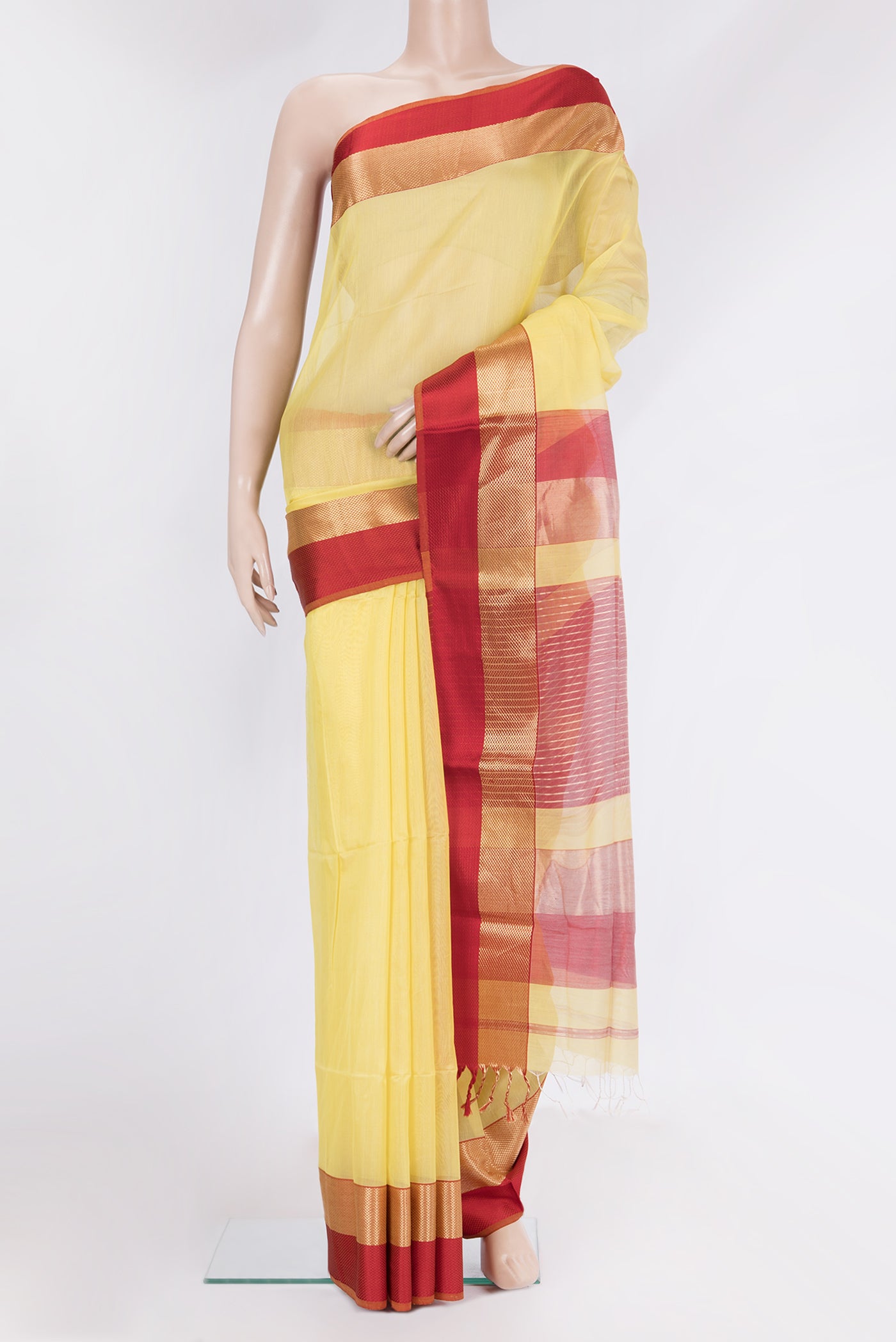 Yellow Maheshwari Silk Saree with Plain Body and Zari And Thread Border.  displayed on a mannequin