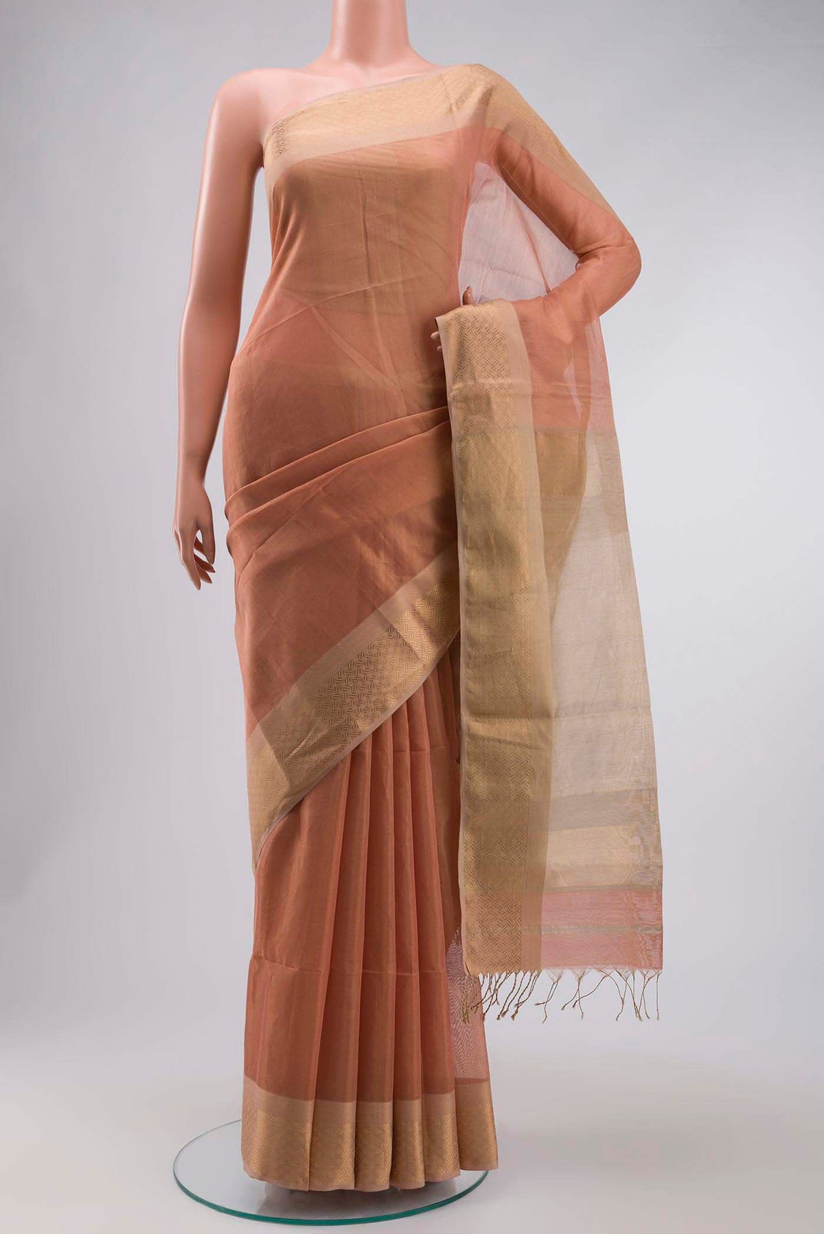 Orange Maheshwari Tissue Silk Saree with Plain Body and Zari Border displayed on a mannequin