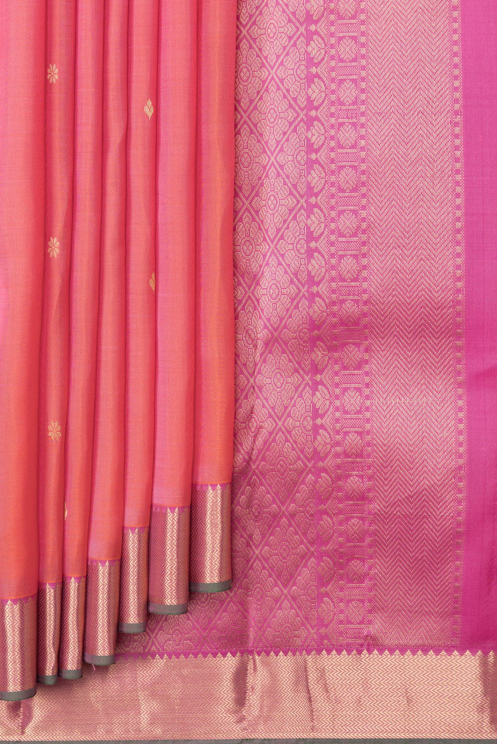 Pleats and pallu of Peach Dual Tone Kanjivaram Silk Saree with Zari Butta on the body and Zari Border. 