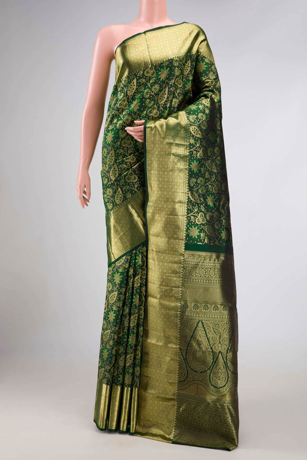 Bottle Green Dual Tone Kanchipuram Silk Saree with Zari Brocade on the body and Zari Border.  displayed on a mannequin