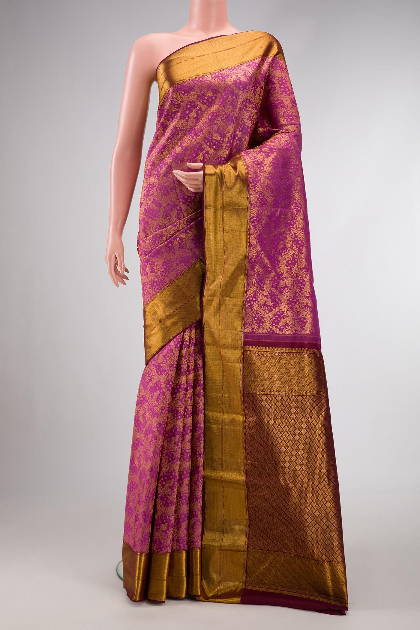 Purple Dual Tone Kanchipuram Silk Saree with Zari Brocade on the body and Zari Border.  displayed on a mannequin