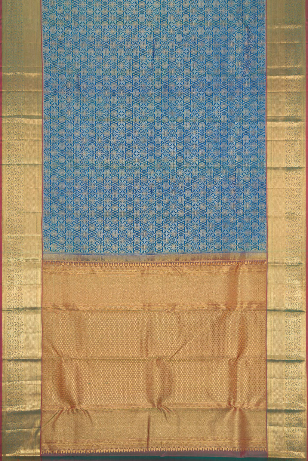 Flat view of Peacock Blue Dual Tone Kanchipuram Silk Saree with Zari Brocade on the body and Zari Border. 