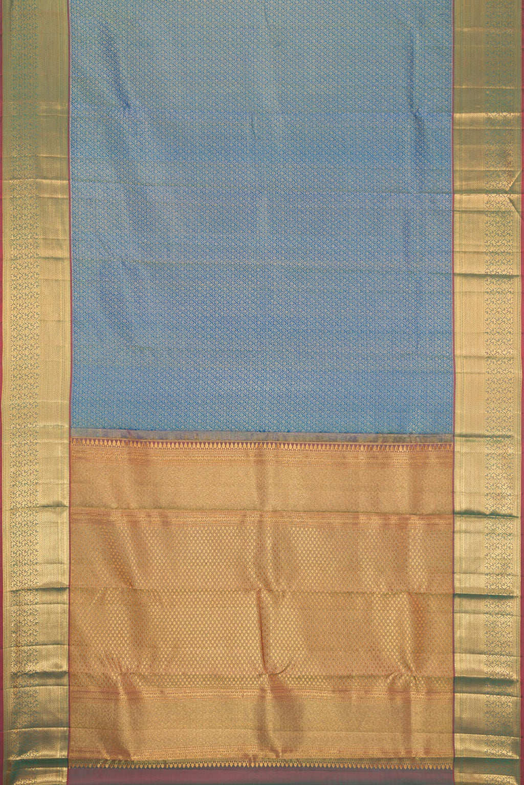 Flat view of Peacock Blue Dual Tone Kanchipuram Silk Saree with Zari Brocade on the body and Zari Border. 