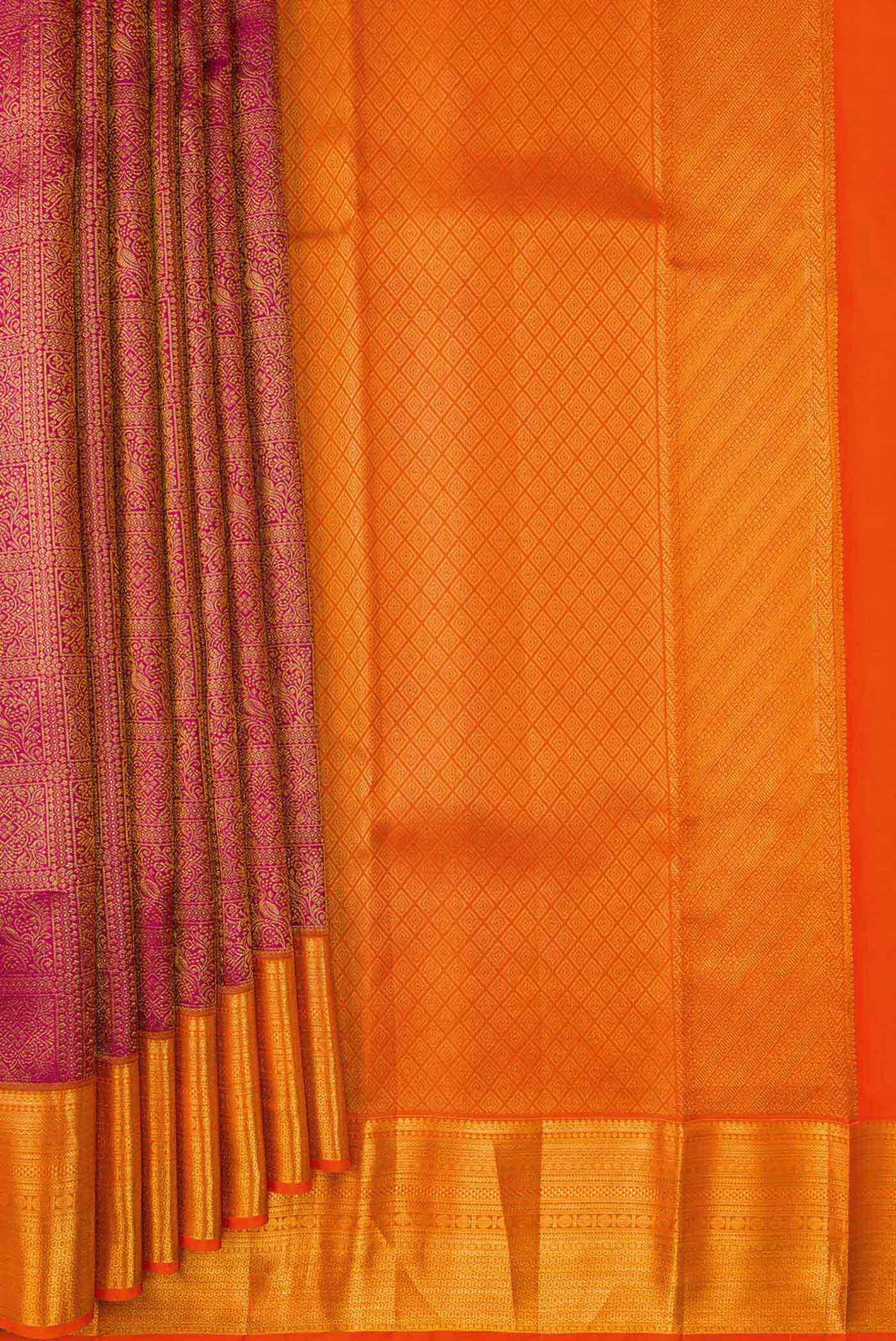 Pleats and pallu of Magenta Dual Tone Kanchipuram Silk Saree with Zari Brocade on the body and Zari Border. 