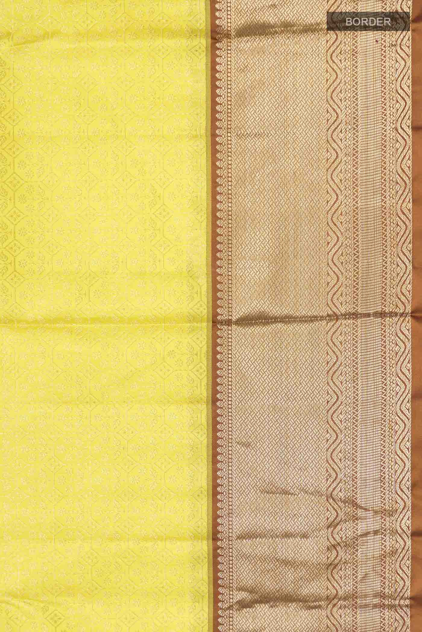 Border image of Yellow Kanchipuram Silk Saree with Zari Brocade on the body and Zari Border