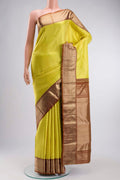 Yellow Kanchipuram Silk Saree with Zari Brocade on the body and Zari Border displayed on a mannequin