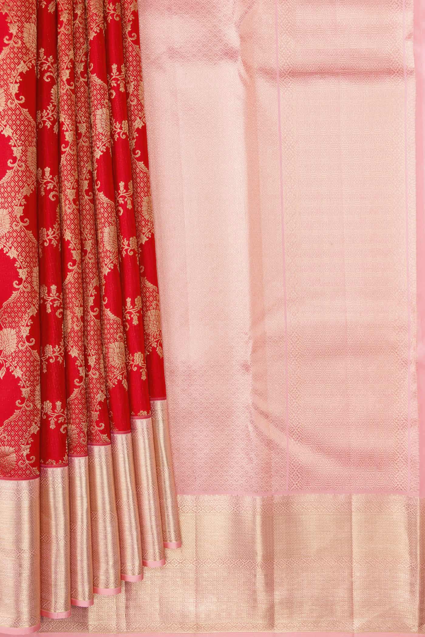 Pleats and pallu of Red Dual Tone Kanchipuram Silk Saree with Zari Brocade on the body and Zari Border. 