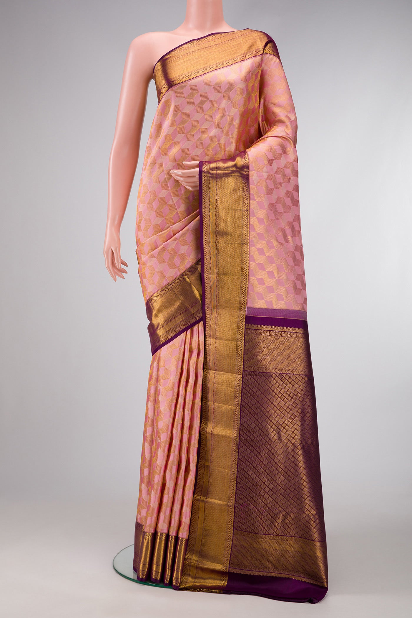 Pink Dual Tone Kanchipuram Silk Saree with Zari Brocade on the body and Zari Border.  displayed on a mannequin