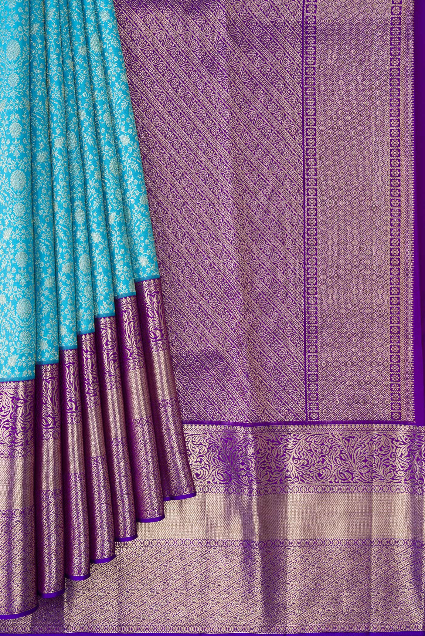 Pleats and pallu of Sky Blue Dual Tone Kanchipuram Silk Saree with Zari Brocade on the body and Fancy Border. 