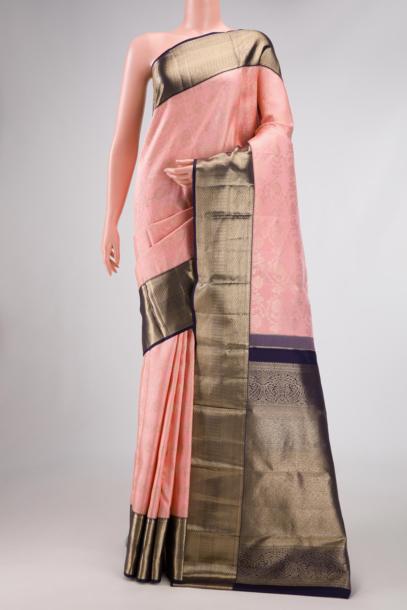 Pink Dual Tone Kanchipuram Silk Saree with Zari Brocade on the body and Zari Border.  displayed on a mannequin