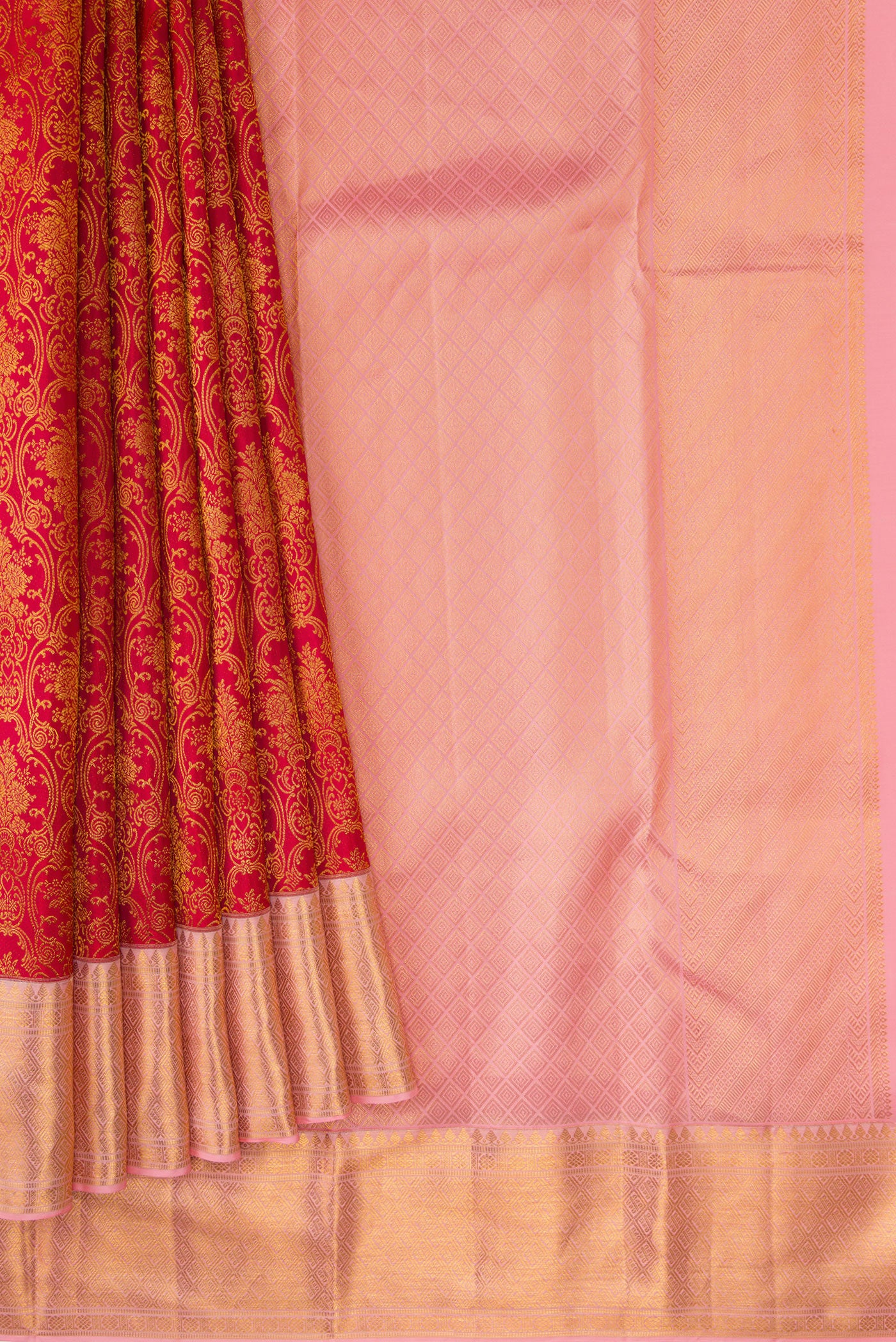 Pleats and pallu of Red Dual Tone Kanchipuram Silk Saree with Zari Brocade on the body and Zari Border. 