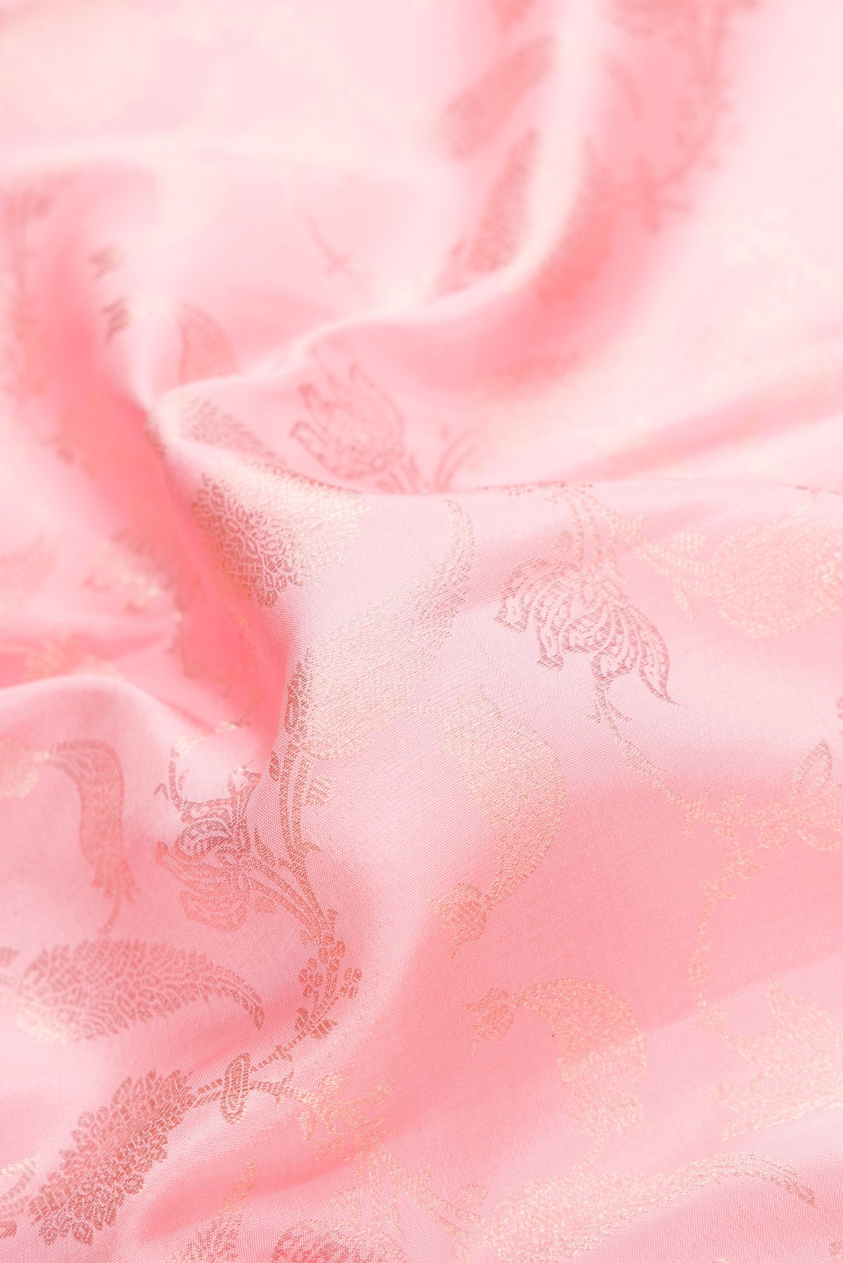 Close up of Pink Dual Tone Kanjivaram Silk Saree with Zari Brocade on the body and Zari Border.  displaying folds