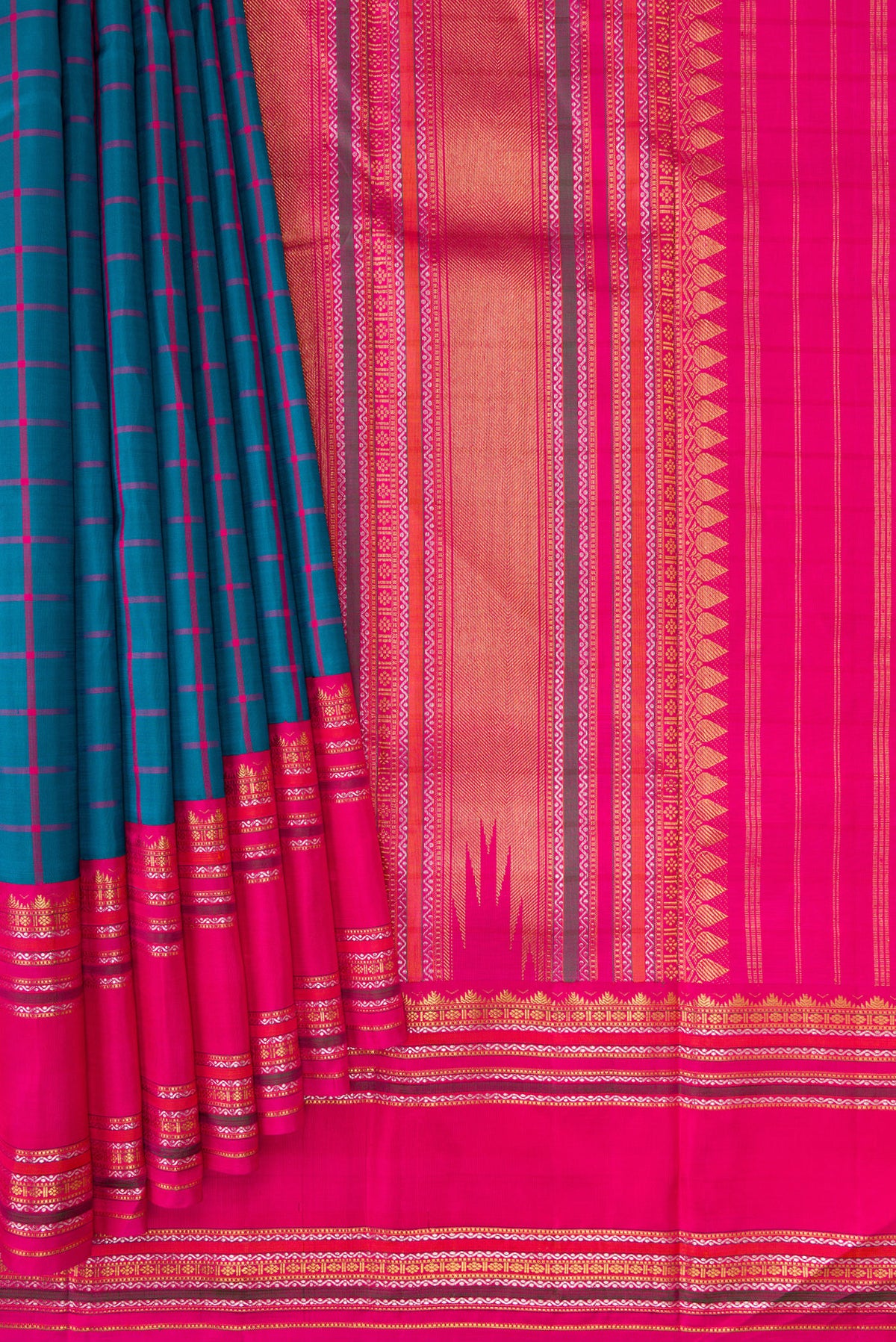 Pleats and pallu of Peacock Blue Dual Tone Kanjivaram Silk Saree with Checked design on the body and Zari Border. 
