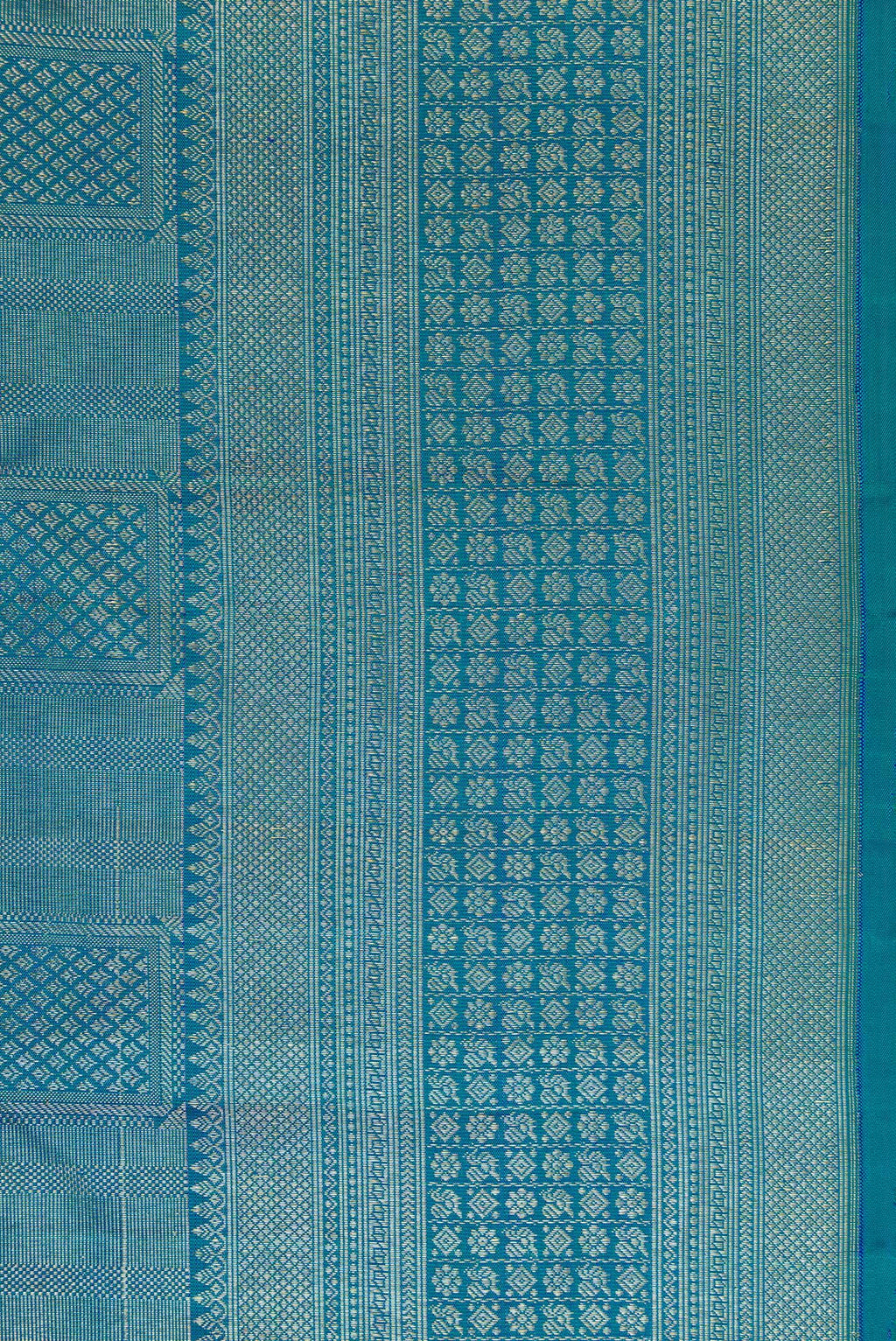 Border image of Peacock Blue Dual Tone Kanchipuram Silk Saree with Zari Brocade on the body and Zari Border. 