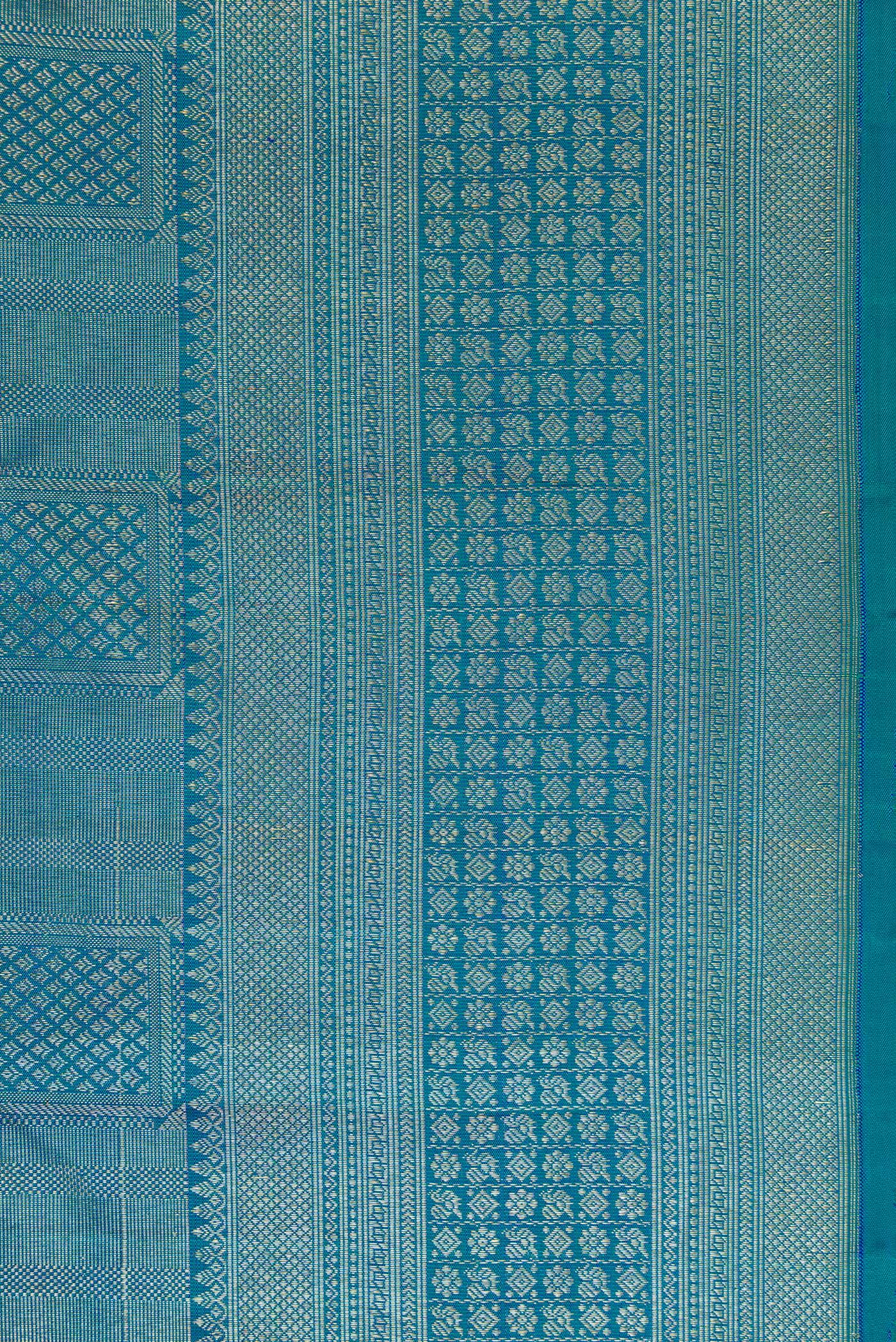 Border image of Peacock Blue Dual Tone Kanchipuram Silk Saree with Zari Brocade on the body and Zari Border. 
