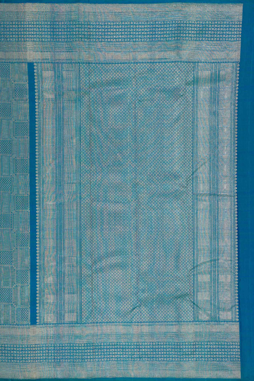 Close up image of the pallu of Peacock Blue Dual Tone Kanchipuram Silk Saree with Zari Brocade on the body and Zari Border. 