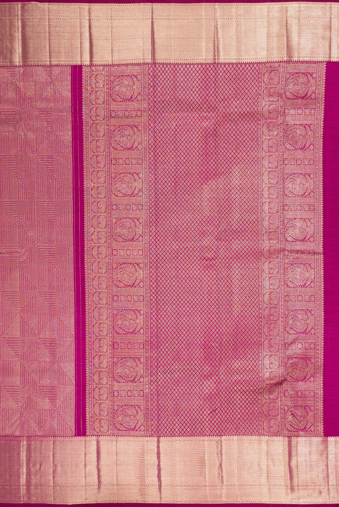 Close up image of the pallu of Magenta Dual Tone Kanchipuram Silk Saree with Zari Brocade on the body and Zari Border. 