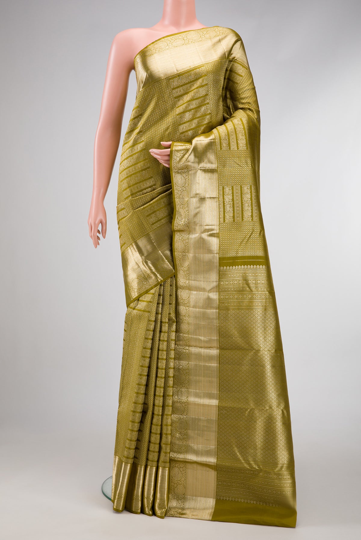 Mehandi Green Dual Tone Kanchipuram Silk Saree with Zari Brocade on the body and Zari Border.  displayed on a mannequin