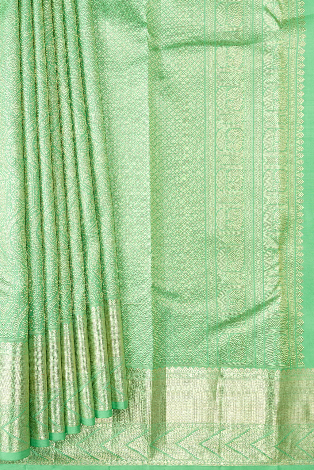 Pleats and pallu of Light Green Dual Tone Kanchipuram Silk Saree with Zari Brocade on the body and Zari Border. 