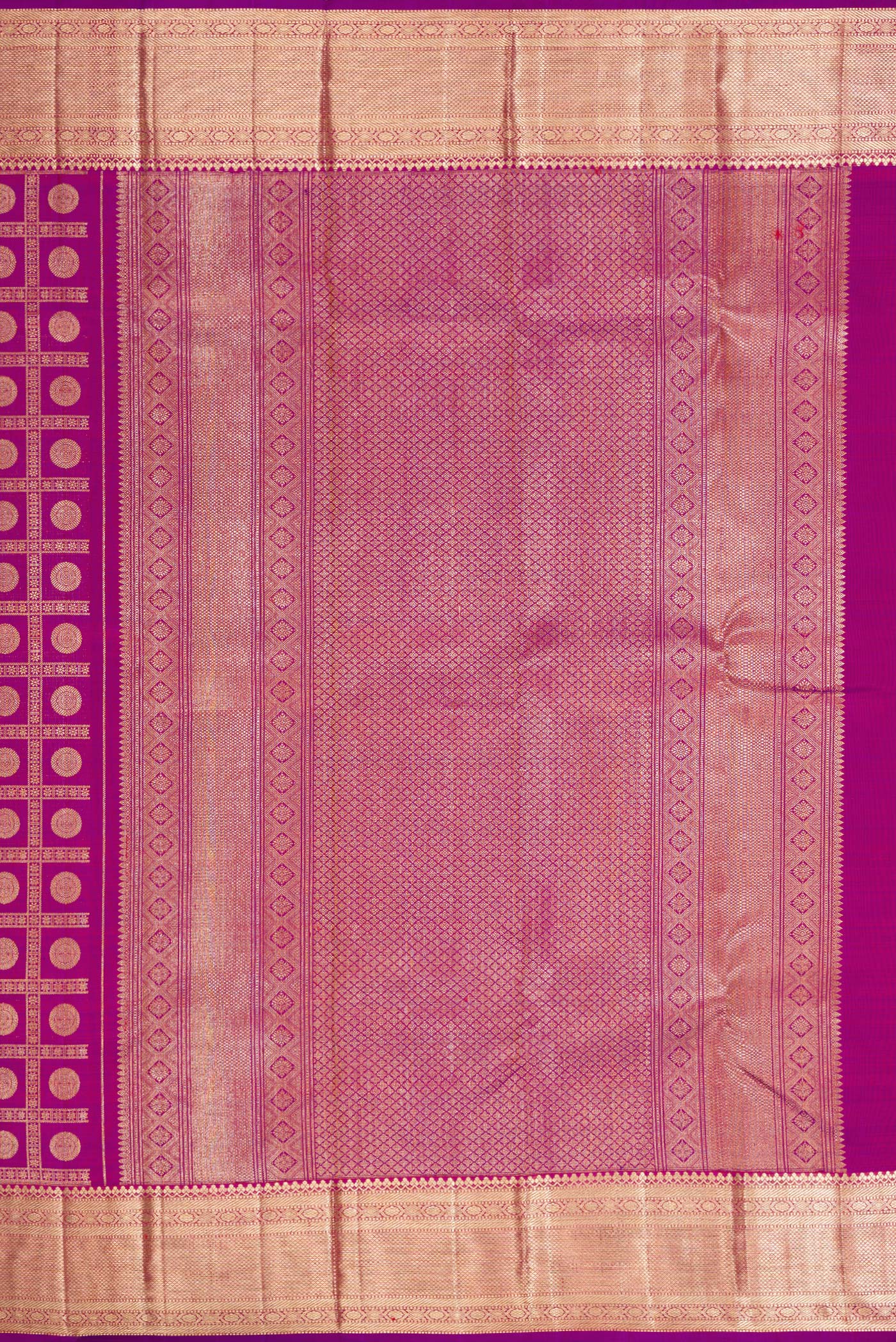Close up image of the pallu of Magenta Dual Tone Kanchipuram Silk Saree with Zari Brocade on the body and Zari Border. 