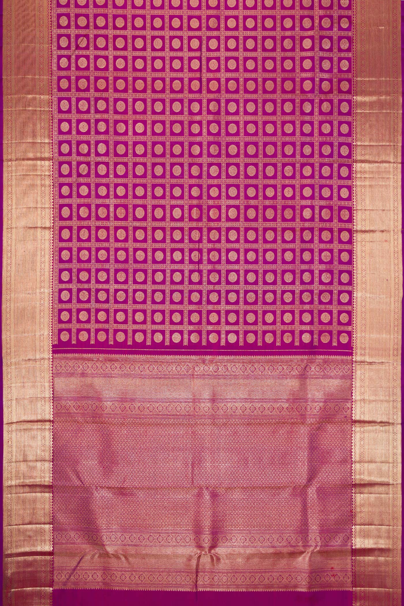 Flat view of Magenta Dual Tone Kanchipuram Silk Saree with Zari Brocade on the body and Zari Border. 