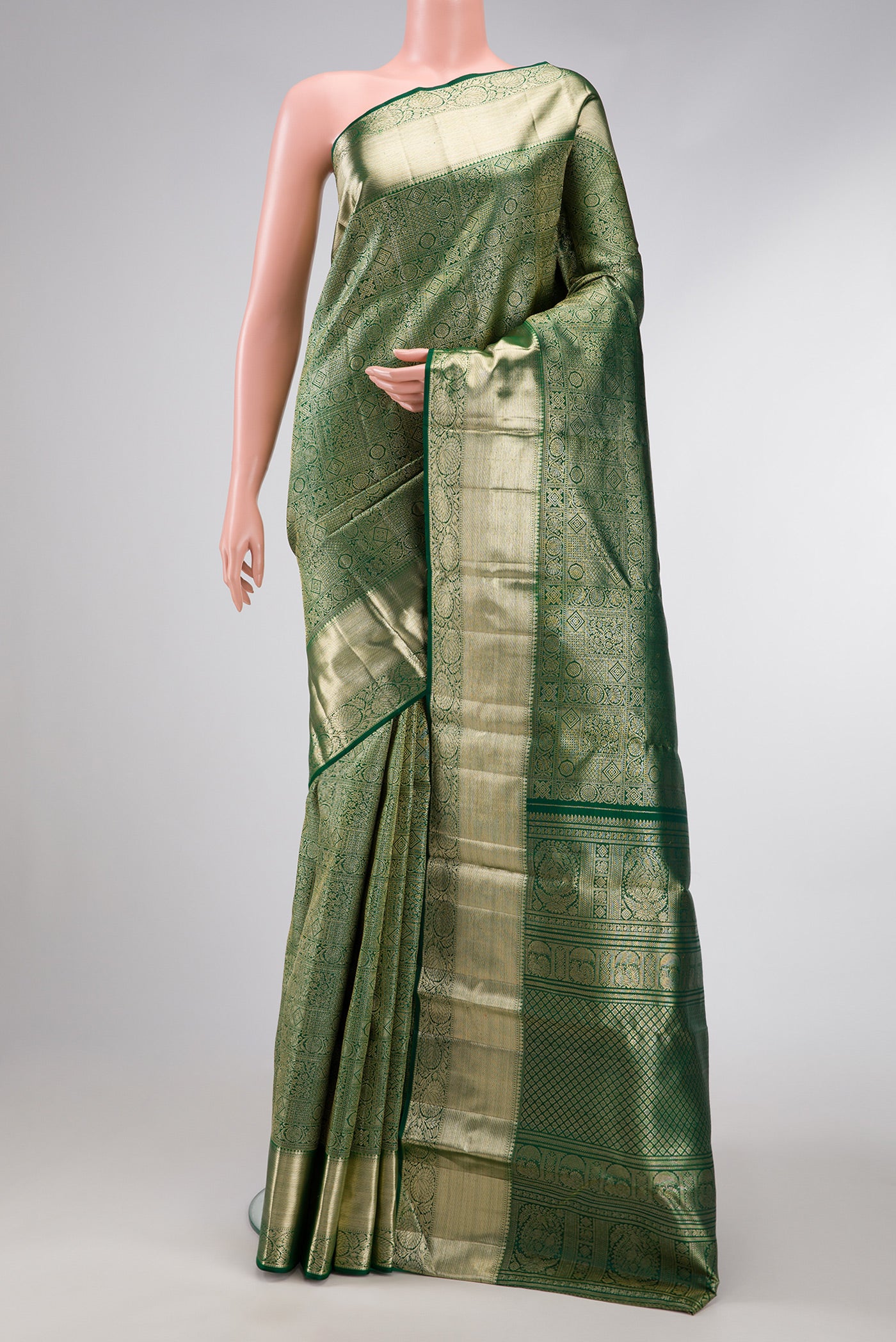 Bottle Green Dual Tone Kanchipuram Silk Saree with Zari Brocade on the body and Zari Border.  displayed on a mannequin