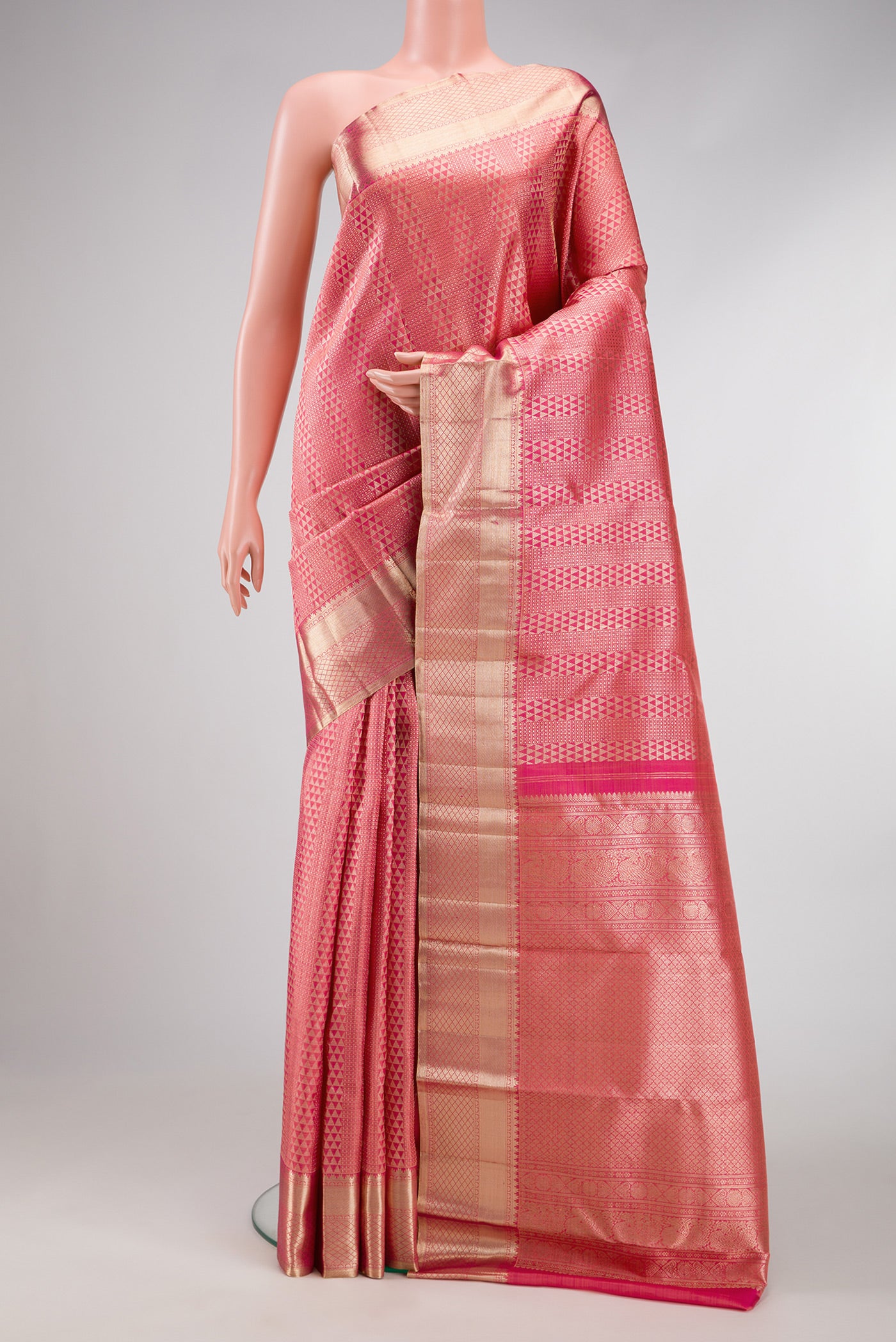 Pink Dual Tone Kanchipuram Silk Saree with Zari Brocade on the body and Zari Border.  displayed on a mannequin