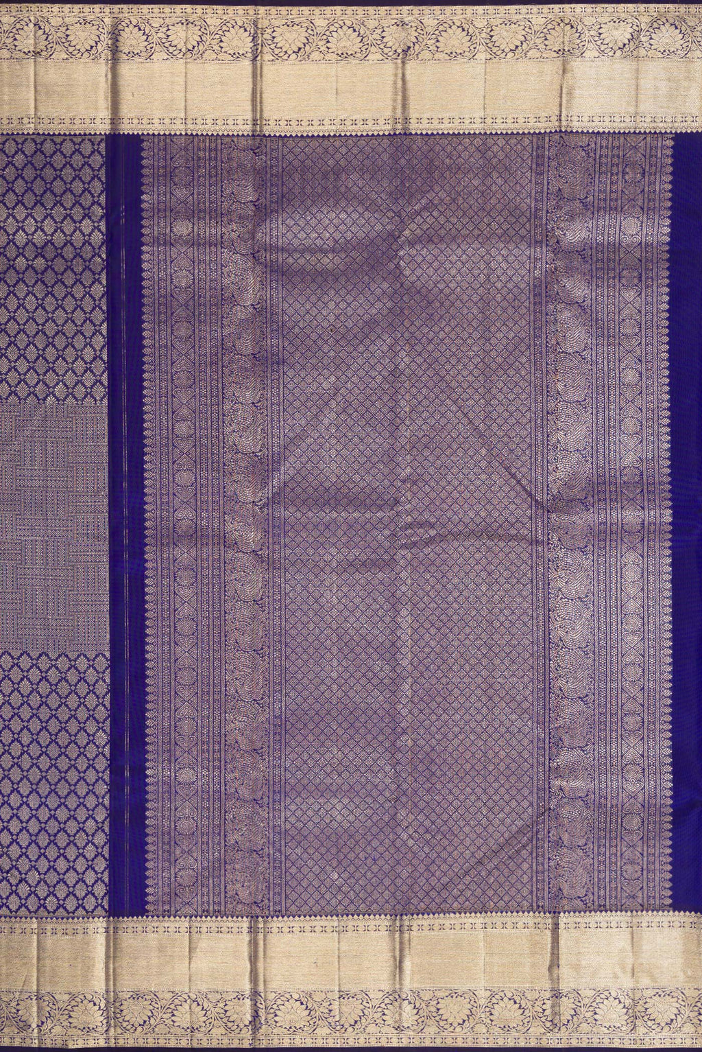 Close up image of the pallu of Royal Blue Dual Tone Kanchipuram Silk Saree with Zari Brocade on the body and Zari Border. 