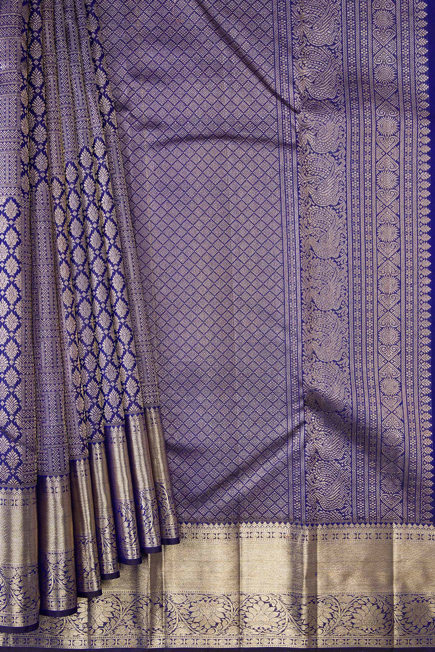 Pleats and pallu of Royal Blue Dual Tone Kanchipuram Silk Saree with Zari Brocade on the body and Zari Border. 