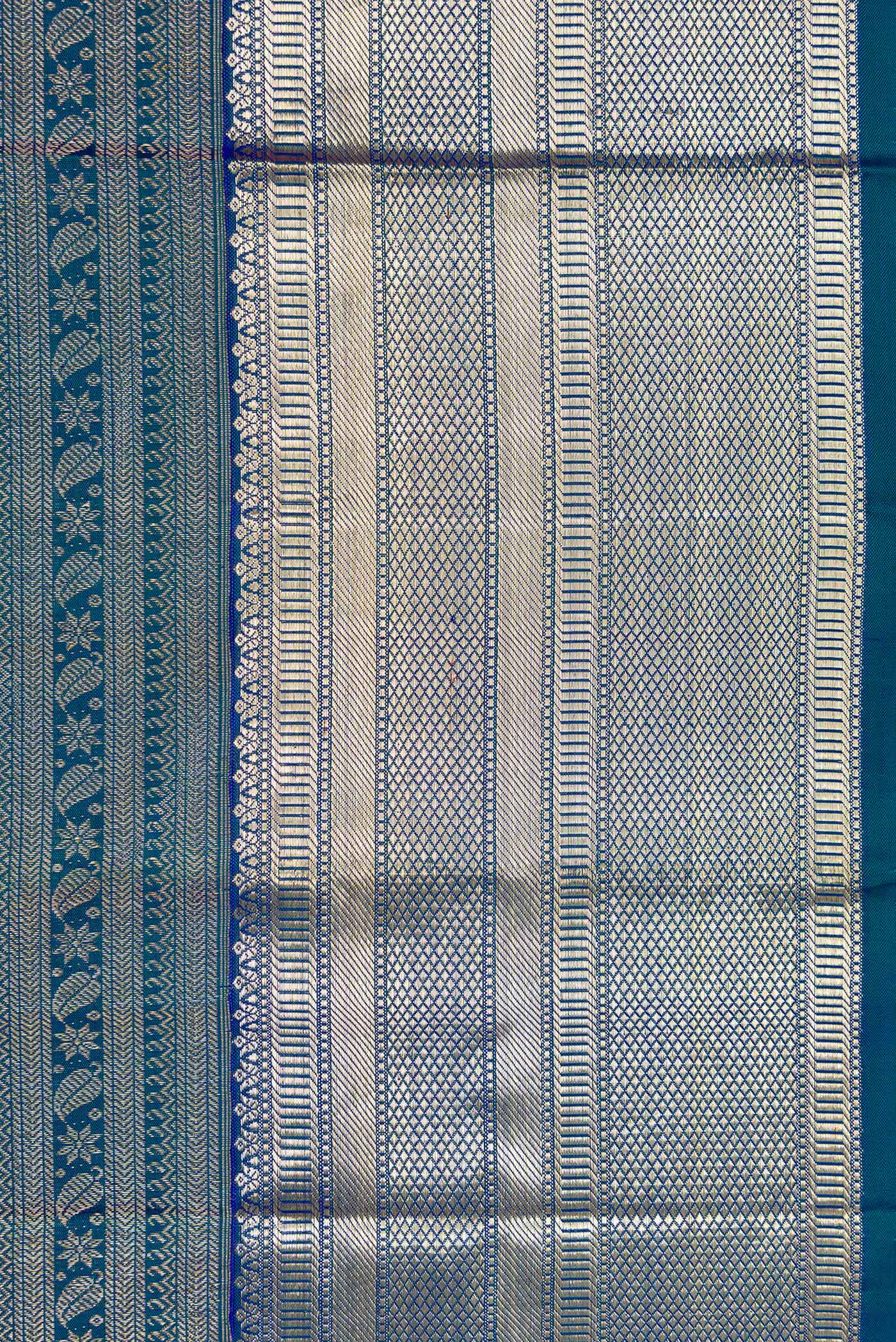 Border image of Peacock Blue Dual Tone Kanchipuram Silk Saree with Zari Brocade on the body and Zari Border. 