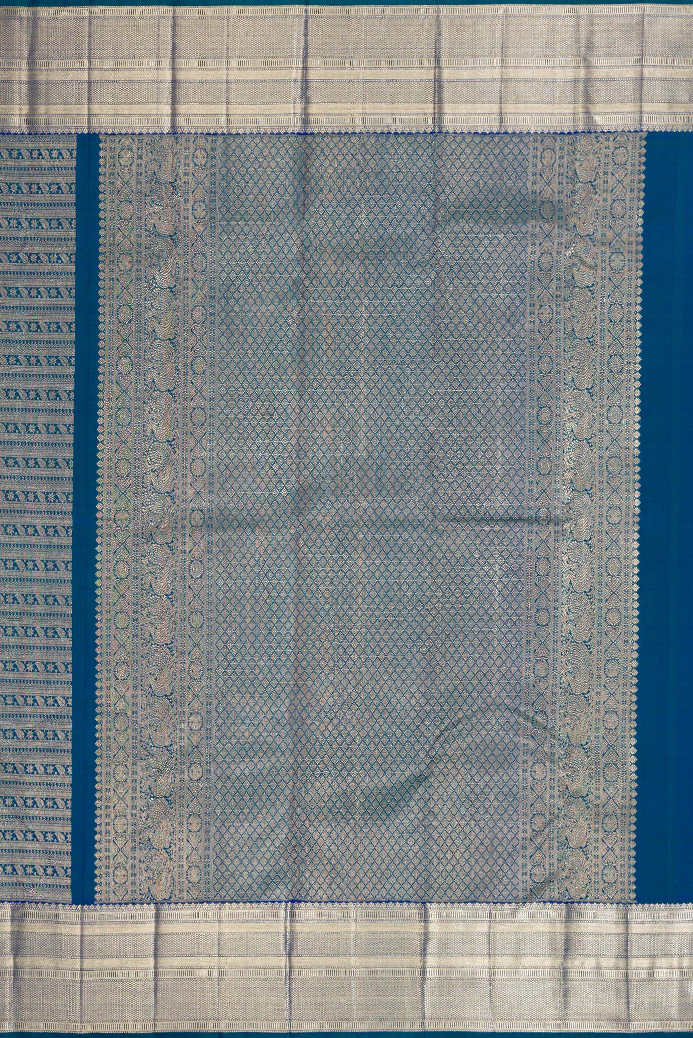 Close up image of the pallu of Peacock Blue Dual Tone Kanchipuram Silk Saree with Zari Brocade on the body and Zari Border. 