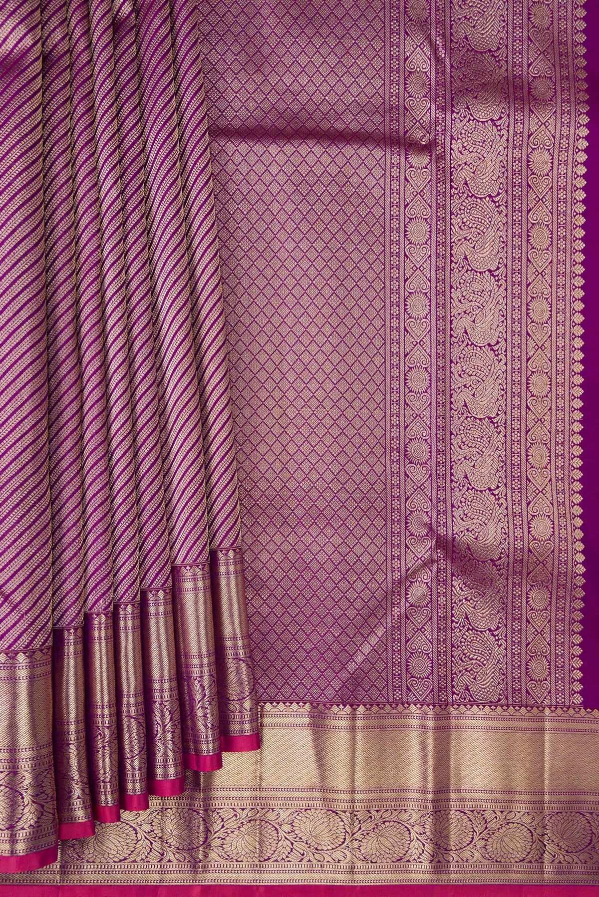 Pleats and pallu of Purple Dual Tone Kanchipuram Silk Saree with Zari Brocade on the body and Zari Border. 