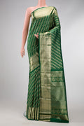 Green Dual Tone Kanchipuram Silk Saree with Zari Brocade on the body and Zari Border.  displayed on a mannequin