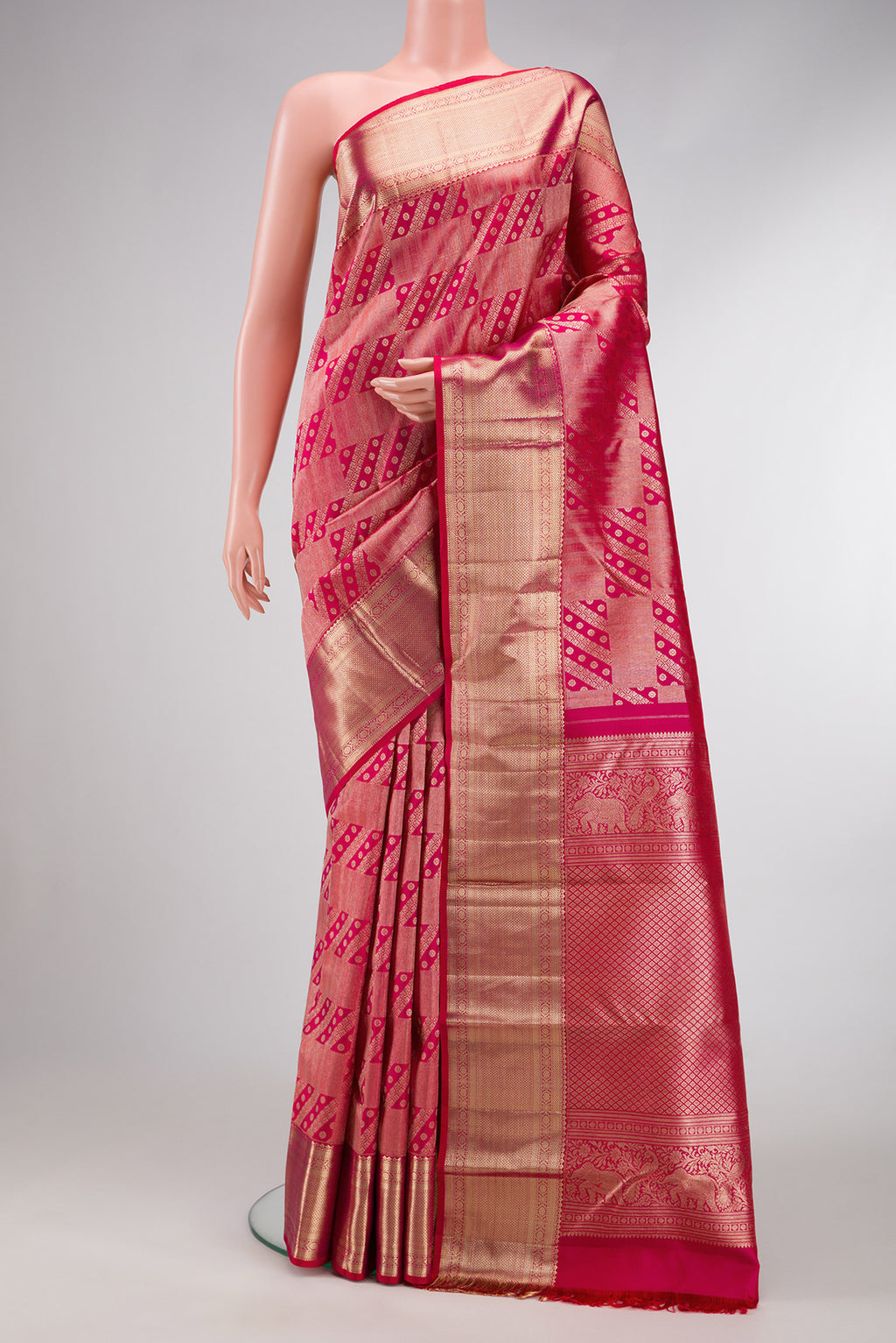 Pink Dual Tone Kanchipuram Silk Saree with Zari Brocade on the body and Zari Border.  displayed on a mannequin